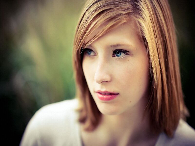 woman with blue eyes looking away