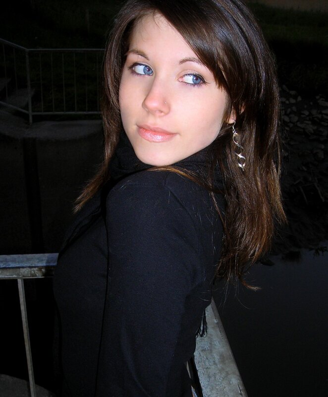 woman with blue eyes looking back
