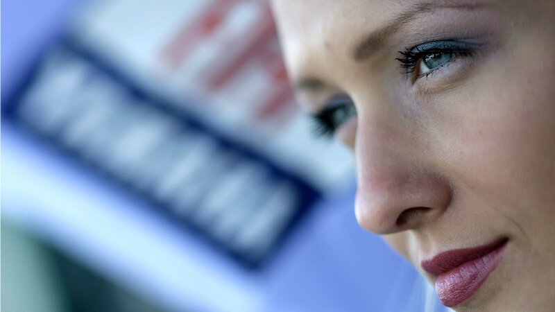 woman with blue eyes looking down