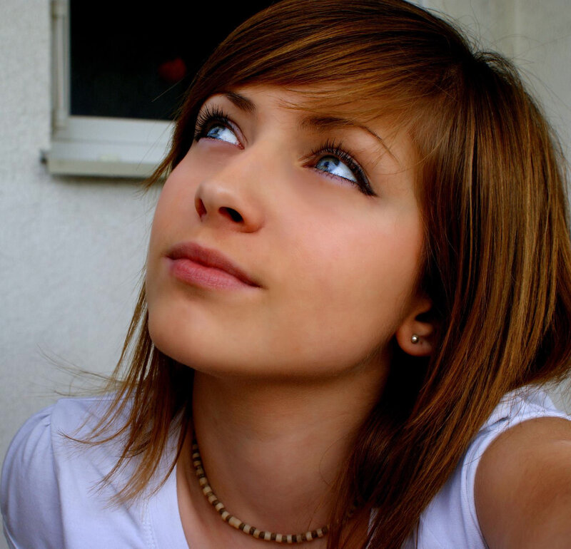 woman with blue eyes looking up