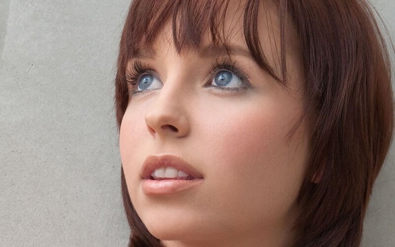 woman with blue eyes looking up