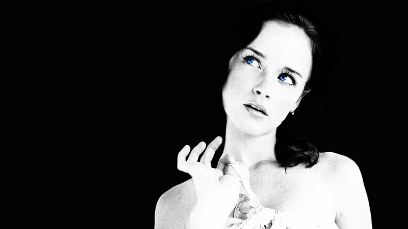 woman with blue eyes looking up