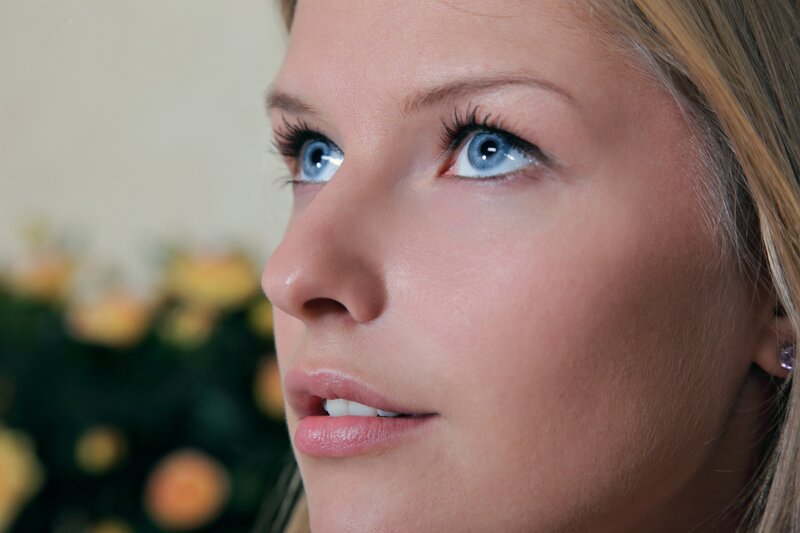 woman with blue eyes looking up