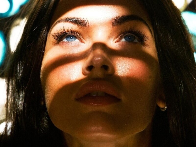 woman with blue eyes looking up