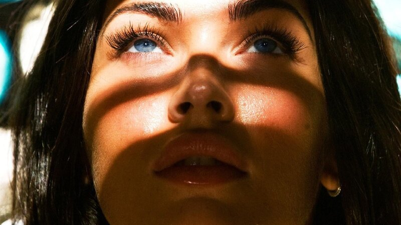 woman with blue eyes looking up