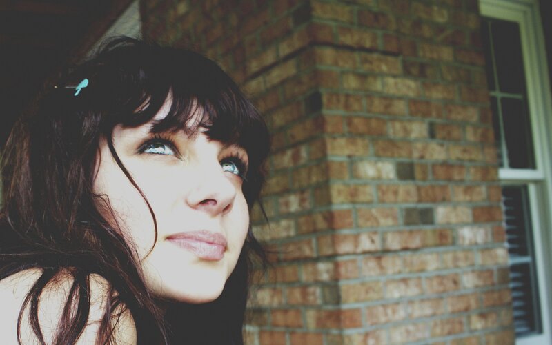 woman with blue eyes looking up