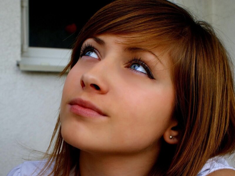 woman with blue eyes looking up