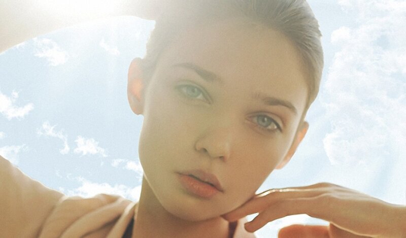 woman with blue eyes looking up