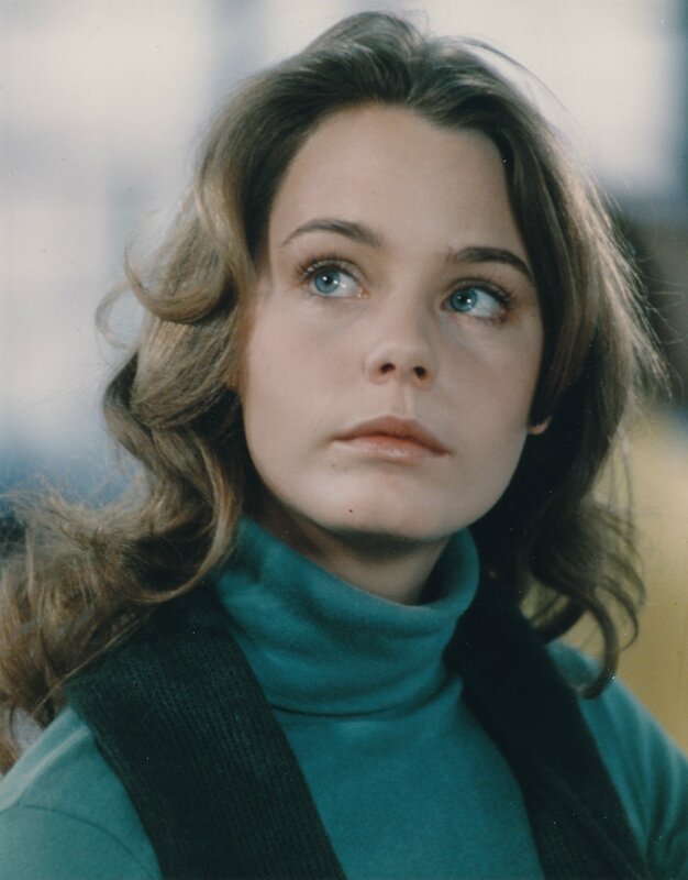 woman with blue eyes looking up