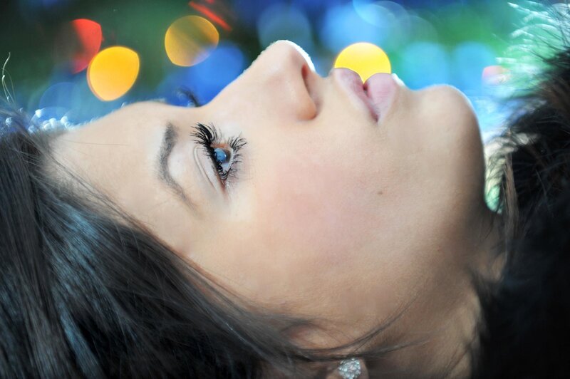 woman with blue eyes looking up