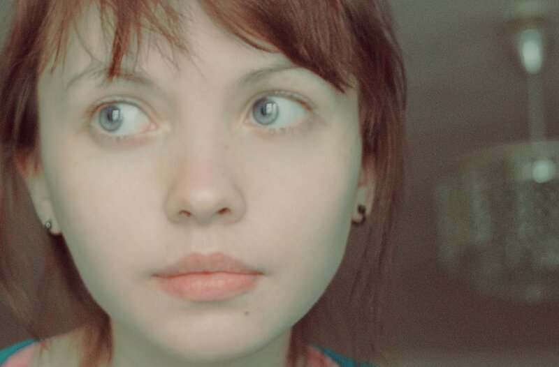 woman with blue eyes looking up