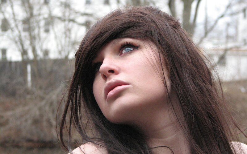 woman with blue eyes looking up