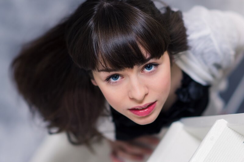 woman with blue eyes looking up