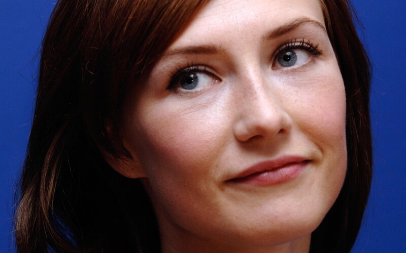 woman with blue eyes looking up