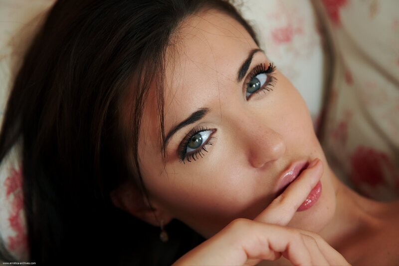 woman with blue eyes lying down