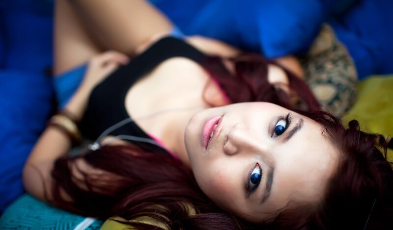 woman with blue eyes lying down