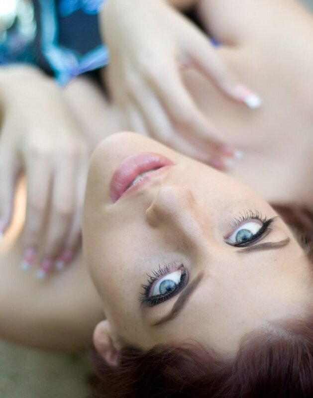 woman with blue eyes lying down