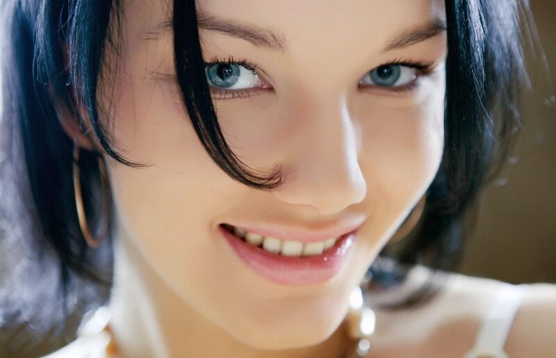 Woman with Blue Eyes — Neutral, Photograph, Earring