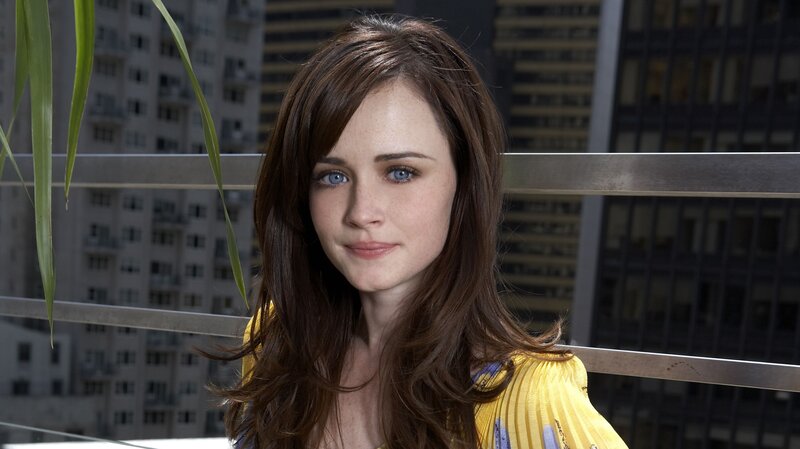 woman with blue eyes on balcony