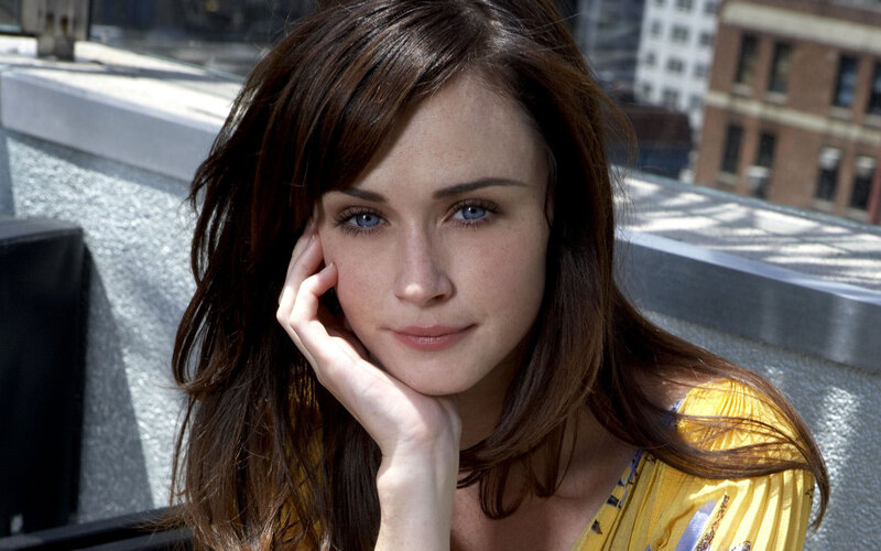 woman with blue eyes on rooftop