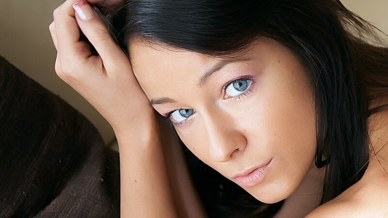 woman with blue eyes resting