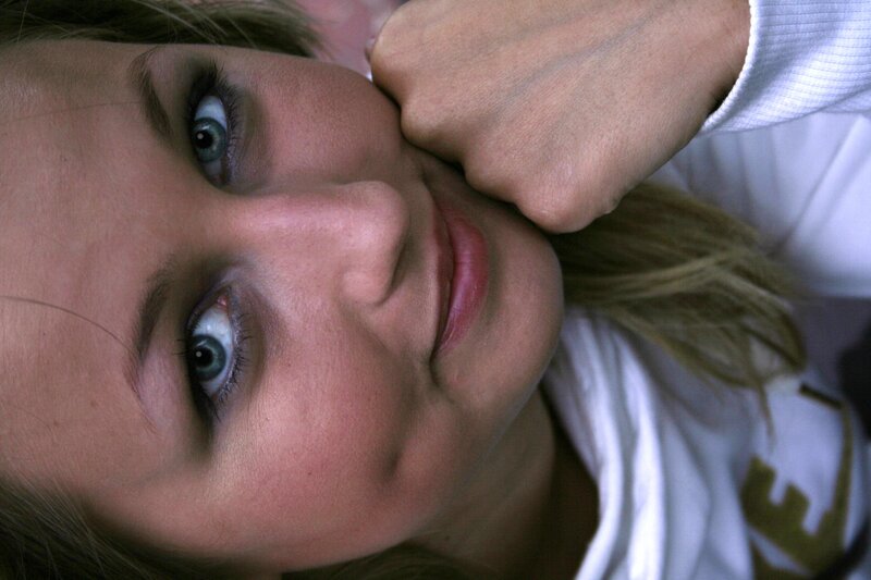 woman with blue eyes resting