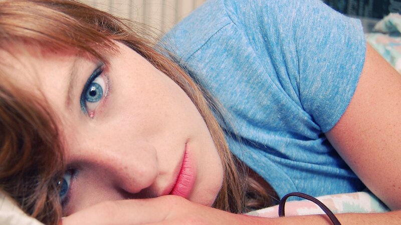 woman with blue eyes resting