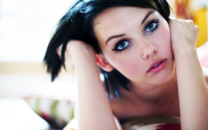 woman with blue eyes resting