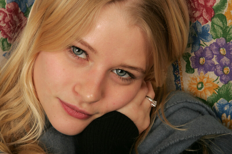 woman with blue eyes resting