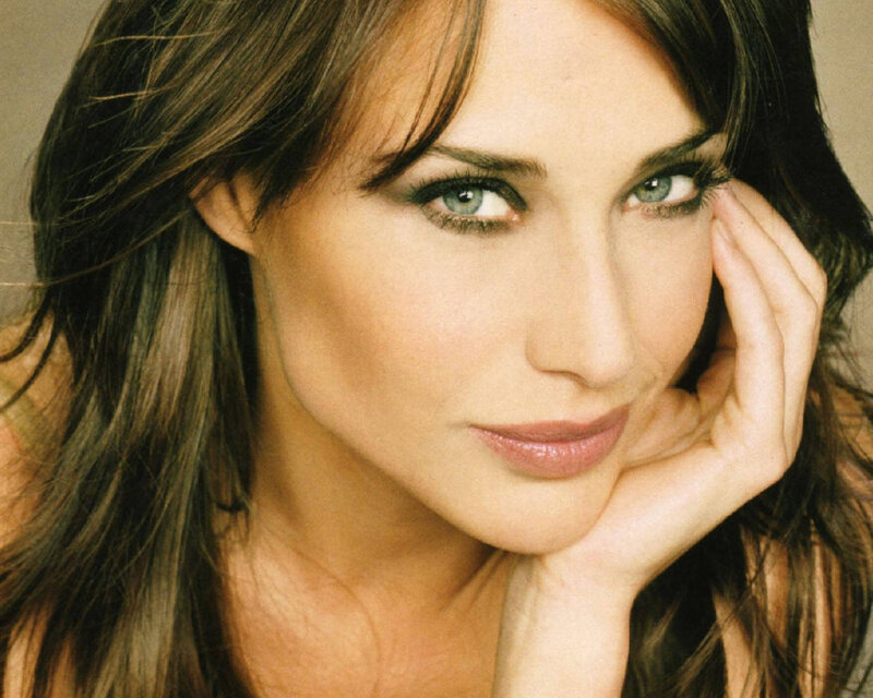 woman with blue eyes resting hand