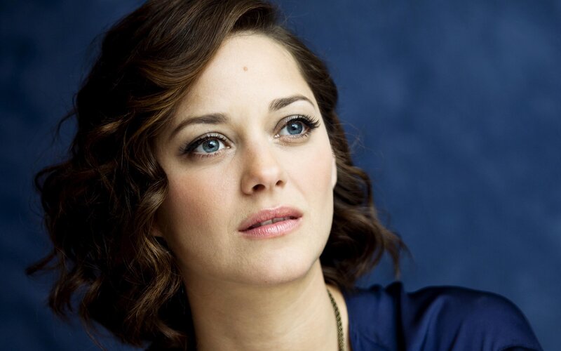 Woman with Blue Eyes — Serious, Photograph, Blue Background, Necklace