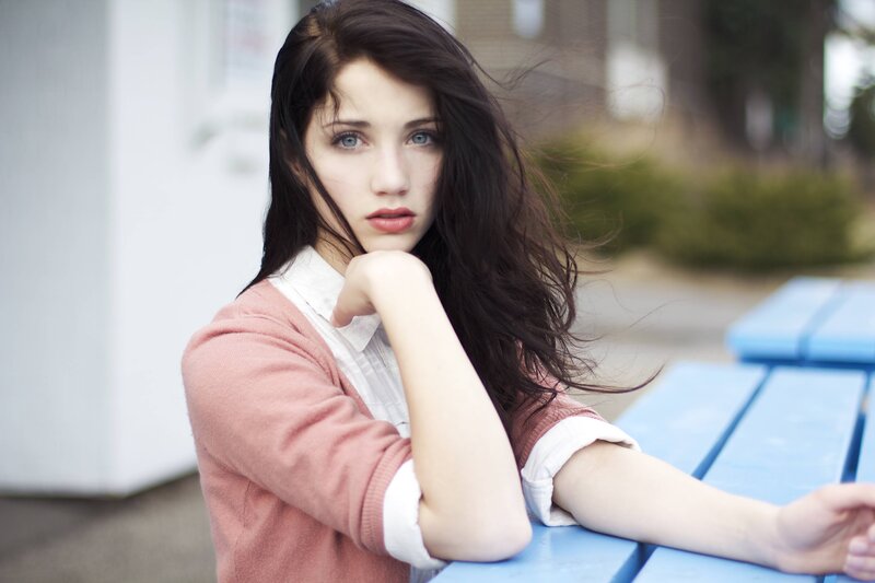 woman with blue eyes sitting outside