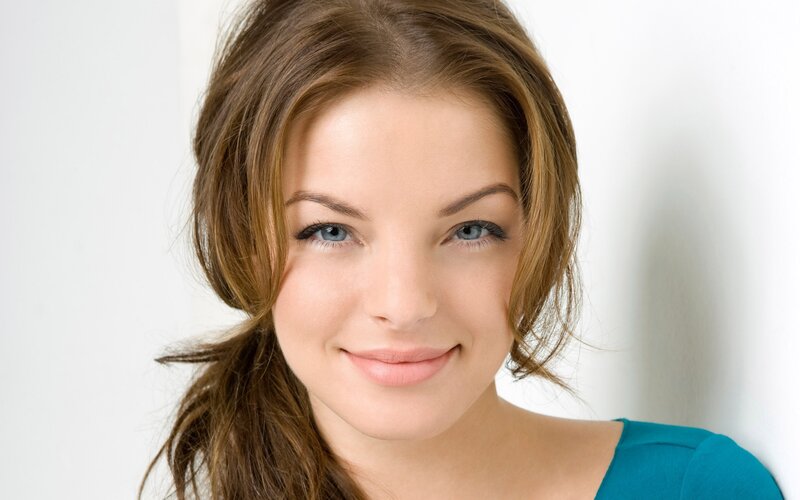 woman with blue eyes smiling
