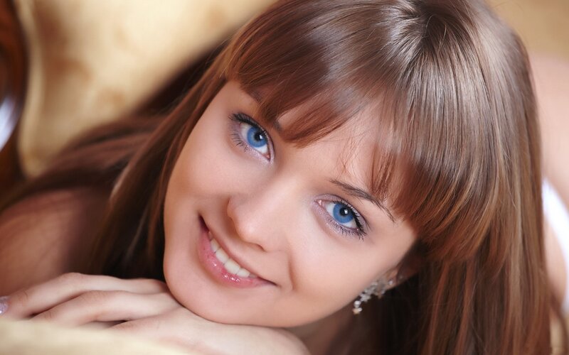 woman with blue eyes smiling