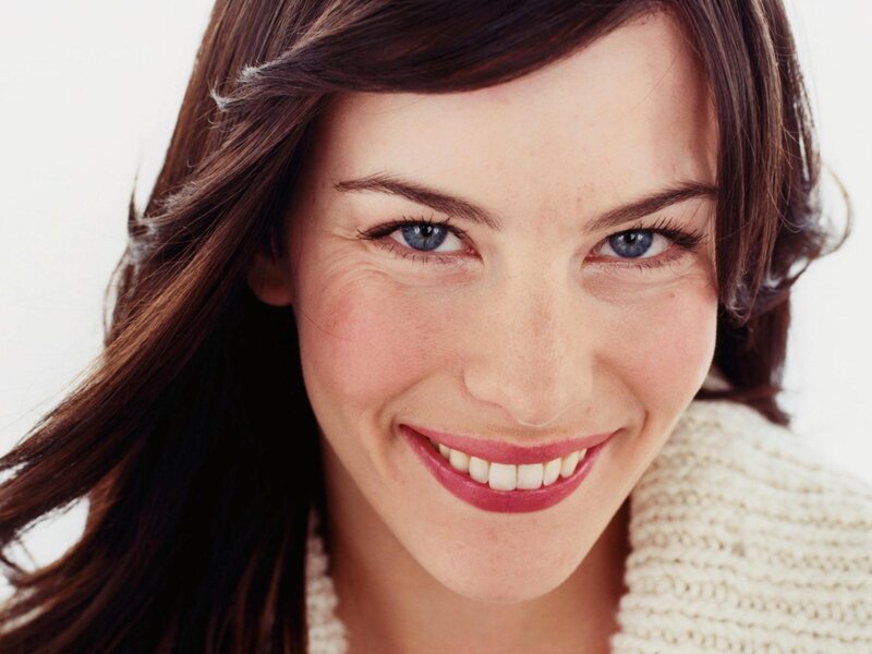 woman with blue eyes smiling