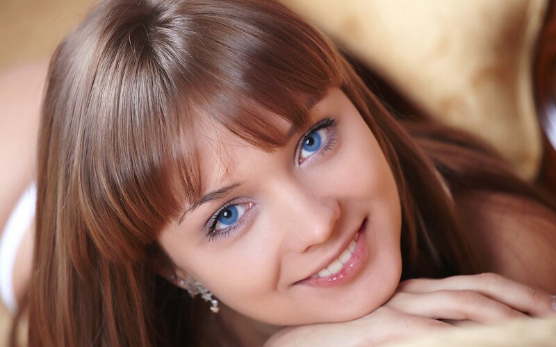 woman with blue eyes smiling