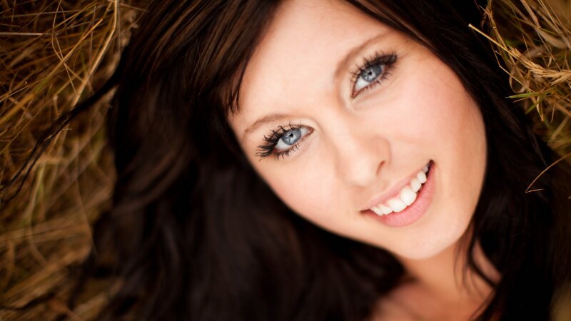 woman with blue eyes smiling