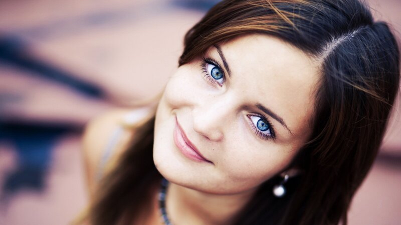 woman with blue eyes smiling