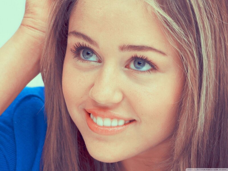 woman with blue eyes smiling