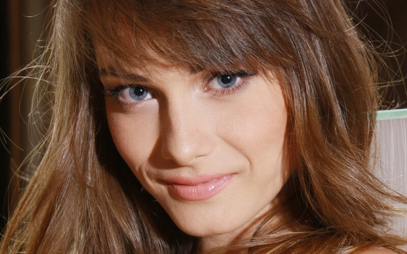 woman with blue eyes smiling