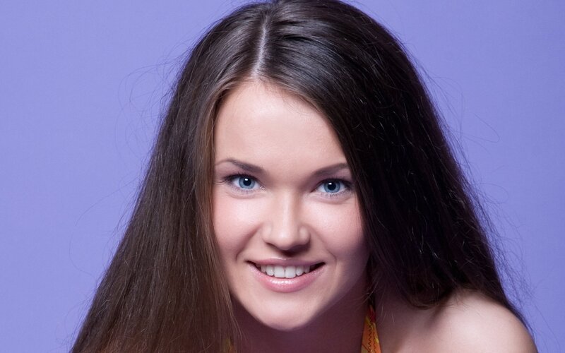 woman with blue eyes smiling