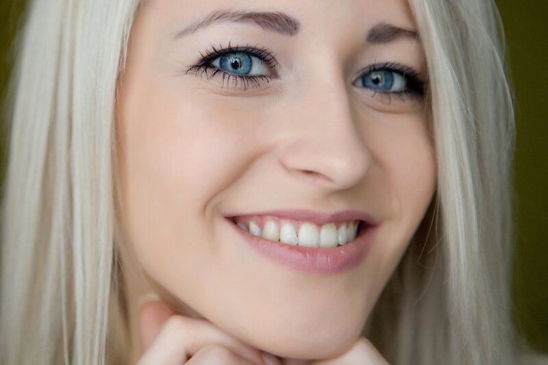 woman with blue eyes smiling