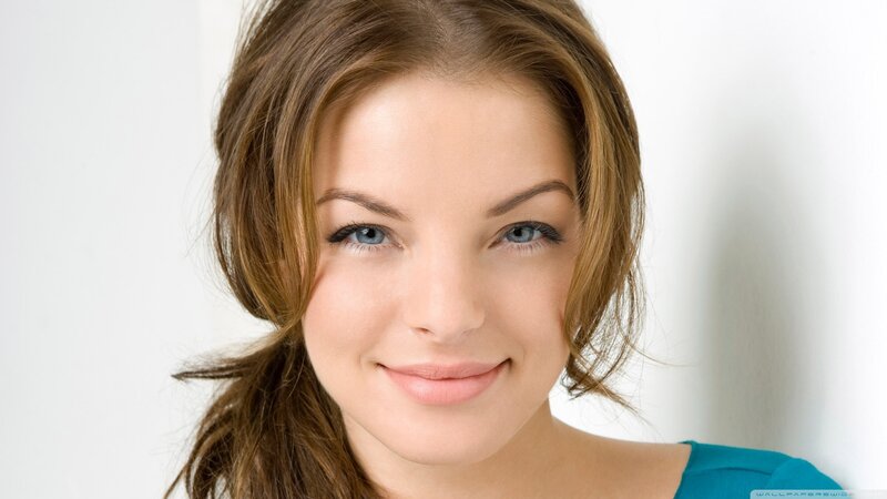 woman with blue eyes smiling
