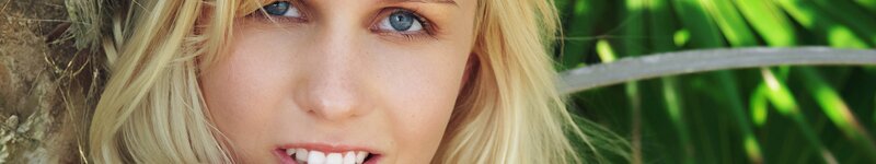 woman with blue eyes smiling