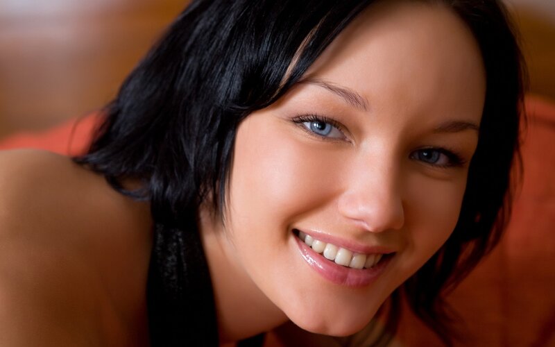 woman with blue eyes smiling