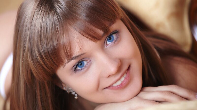 woman with blue eyes smiling