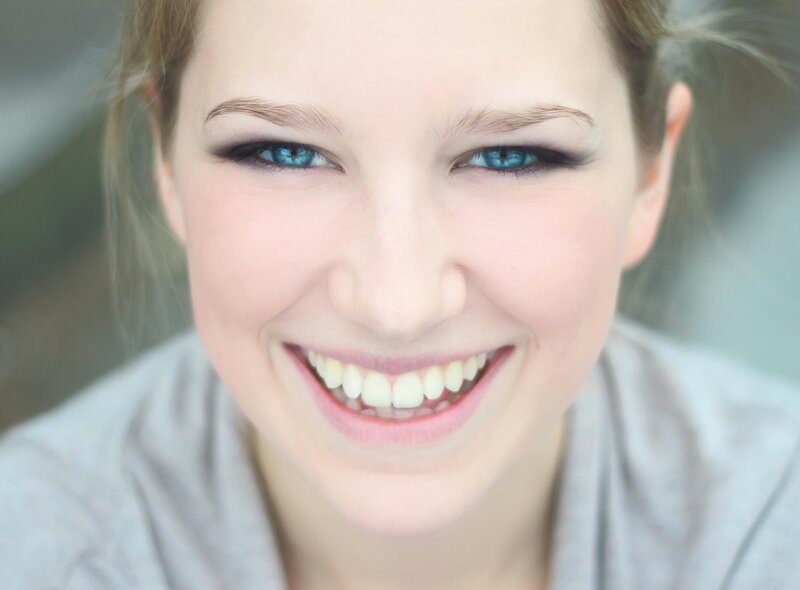 woman with blue eyes smiling