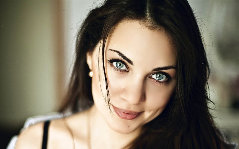 woman with blue eyes smiling