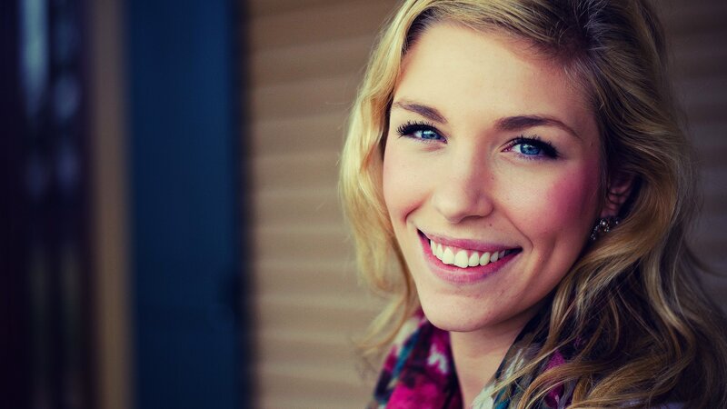woman with blue eyes smiling