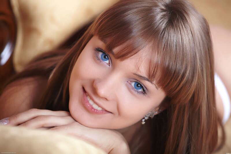 woman with blue eyes smiling